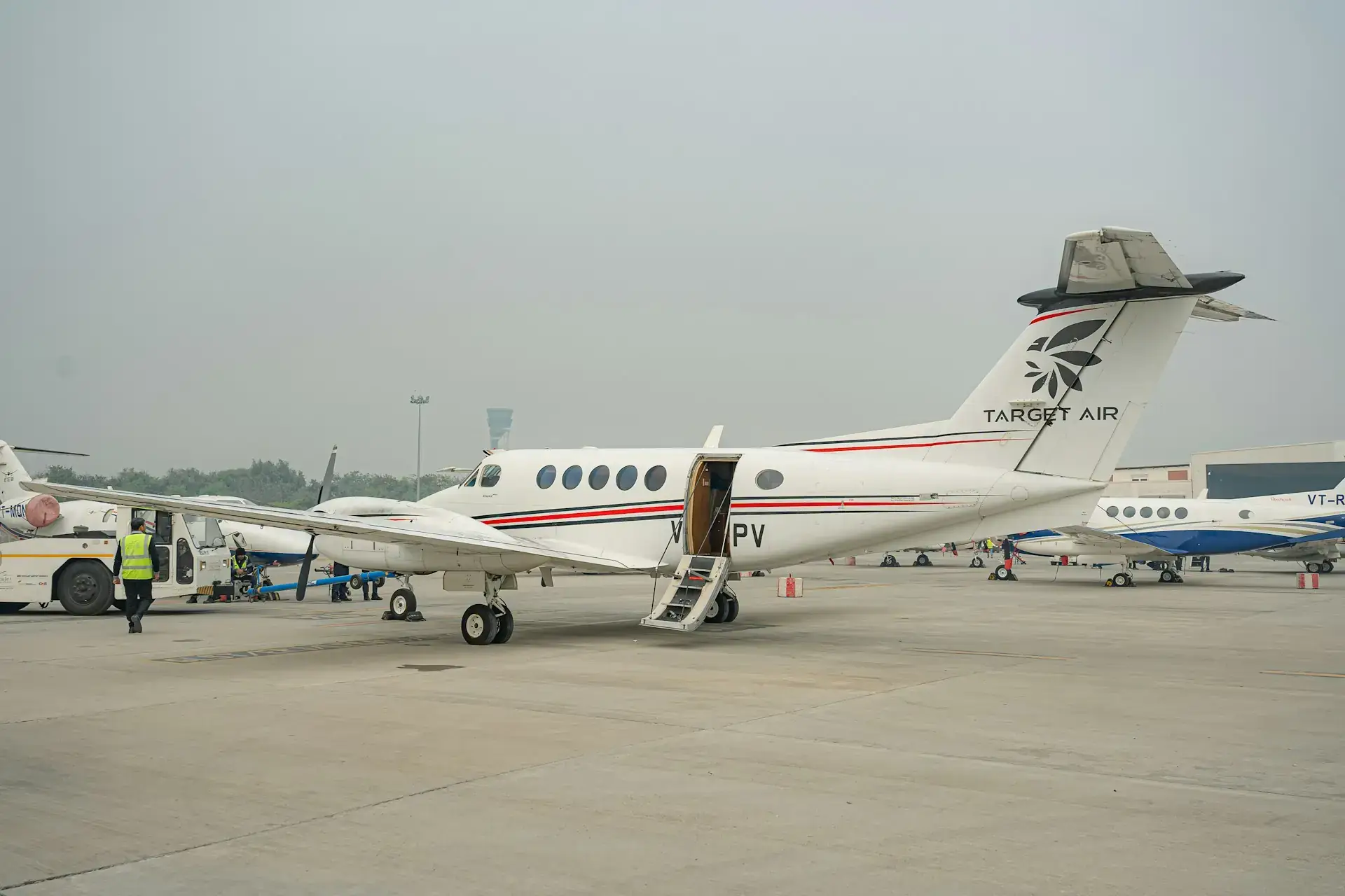 Side view of an airplane on a runway